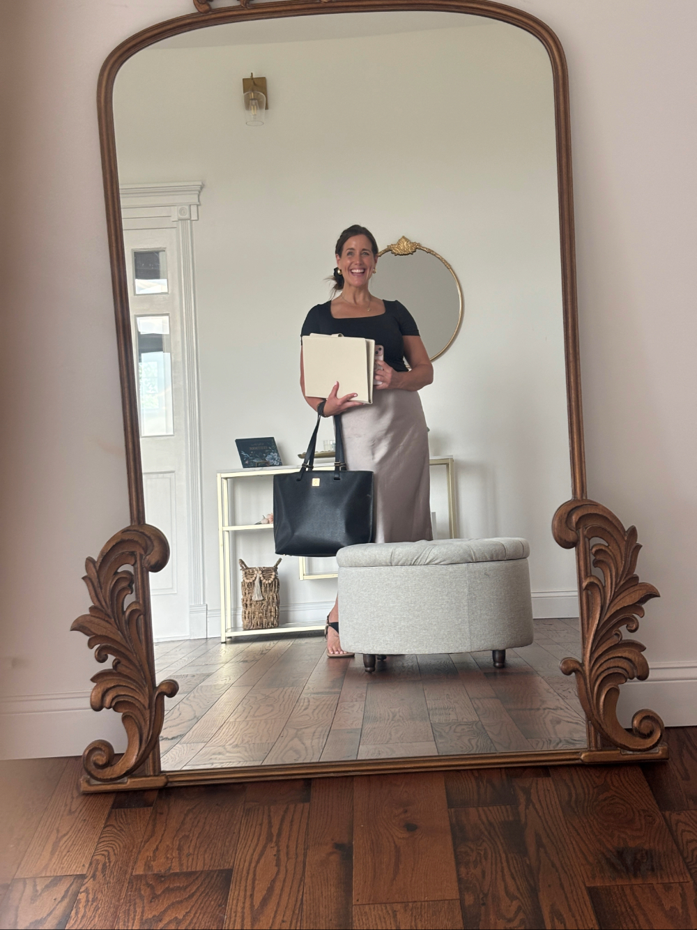 wedding coordinator looking into mirror in bridal suite
